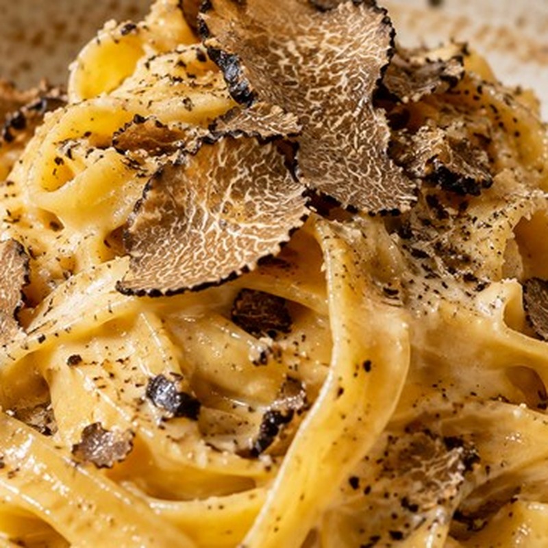 Fotografia illustrativa: Tajarin al tartufo